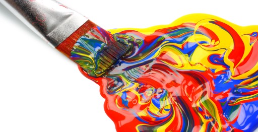 Paint brush with a swirl of colours